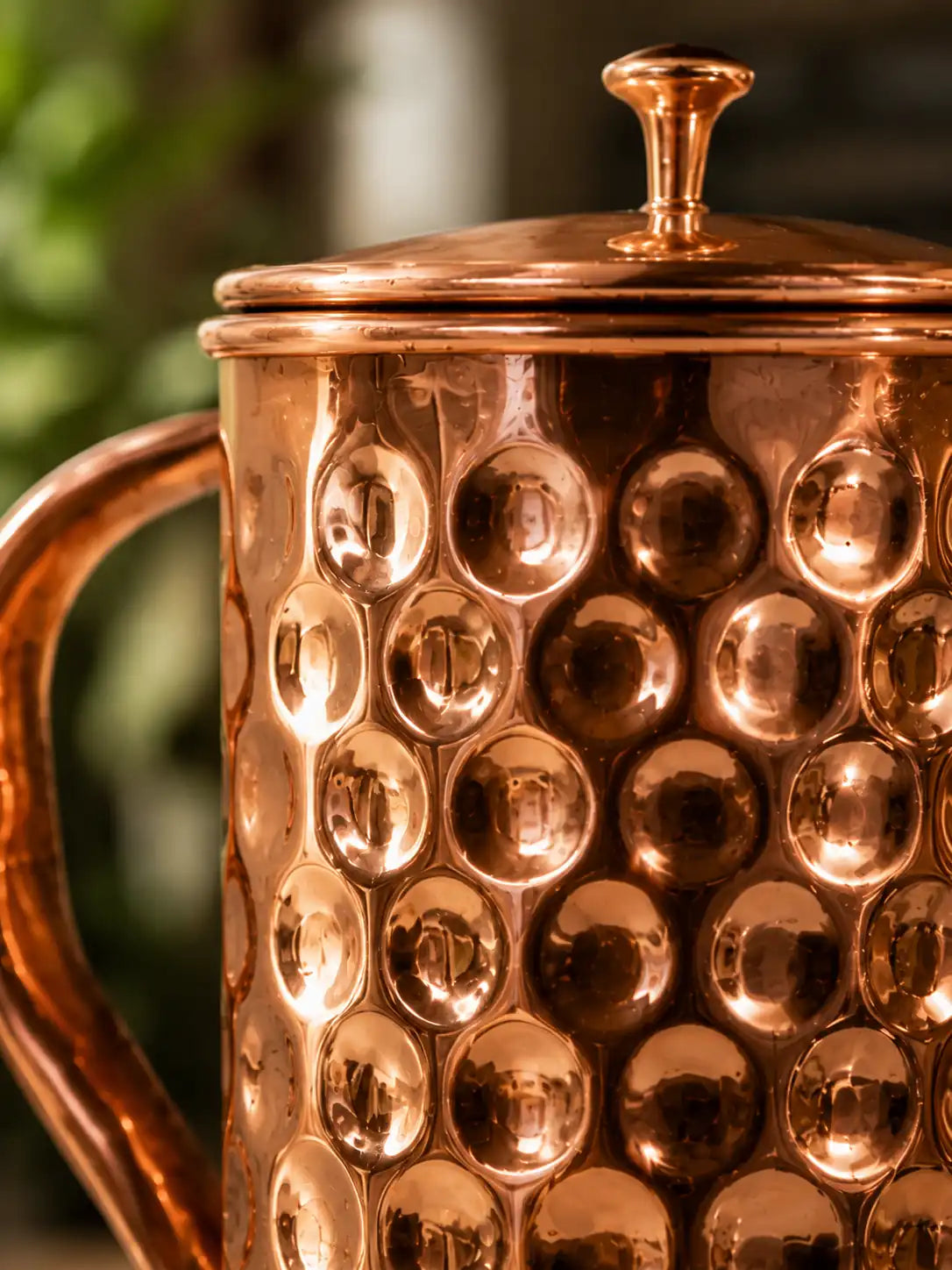 Close-up of handcrafted diamond hammered copper texture on the Diamond Pure Copper Water Pitcher.