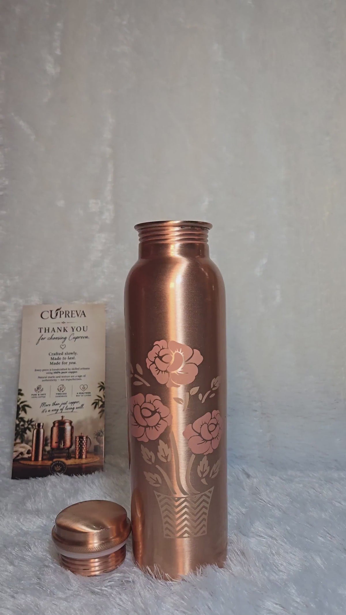Magic pure copper water bottle with colour-changing rose design when cold